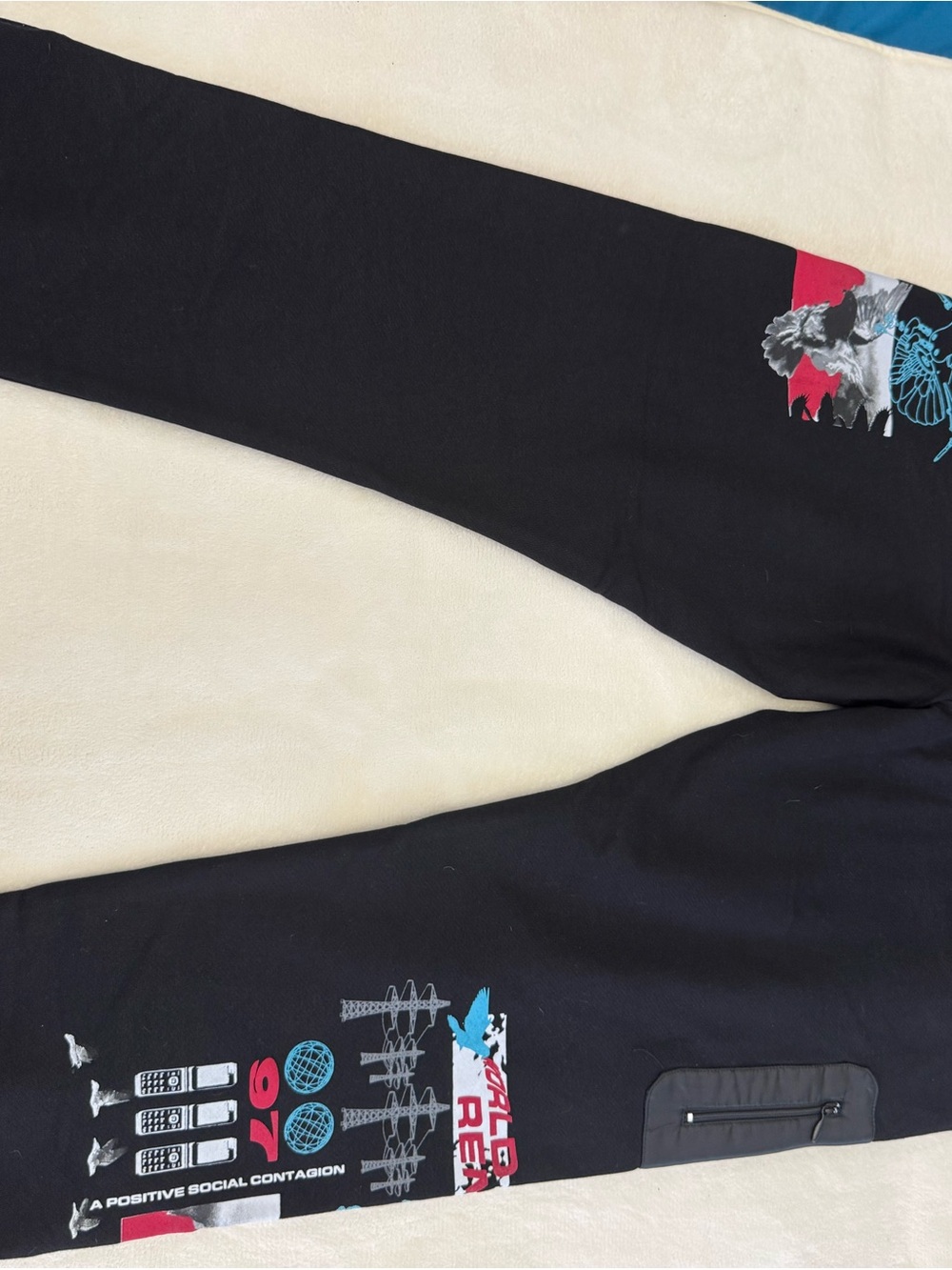 Staple Black Graphic Joggers with Red & Blue Accents